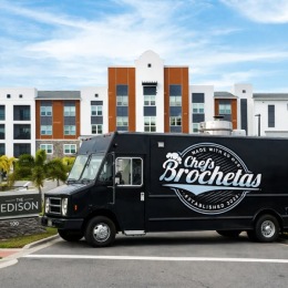 food truck in front of apartment
