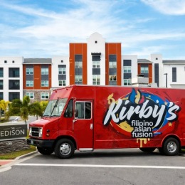 food truck in front of apartment